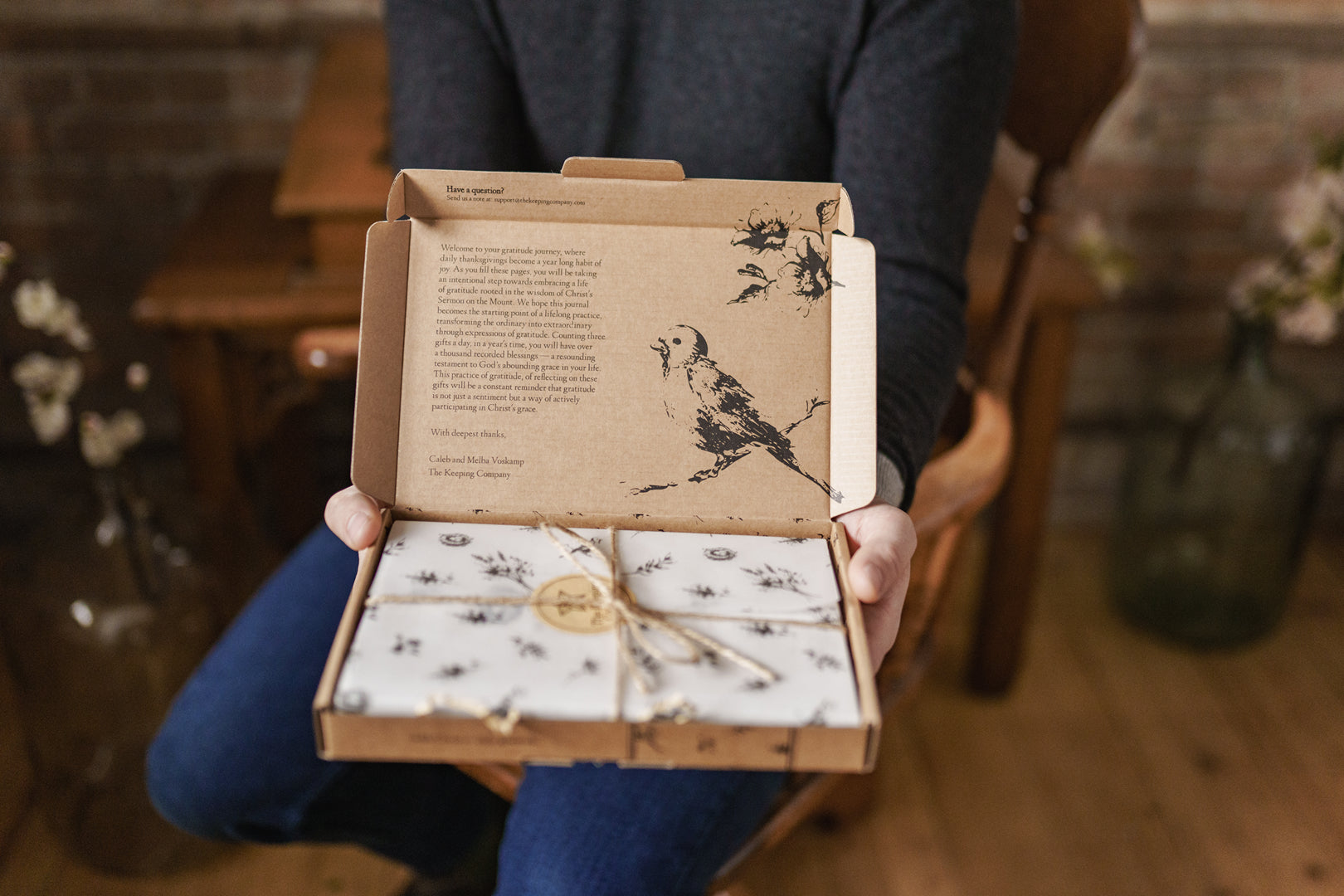 Elegantly Voskamp crafted Gratitude Journal, with linen-bound hardcover, featuring daily prompts for recognizing over 1,000 gifts of blessing throughout the year, perfect for daily gratitude practice.