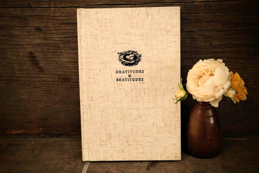 Elegantly crafted Gratitude Journal inspired by Ann Voskamp, with linen-bound hardcover, featuring daily prompts for recognizing over 1,000 gifts of blessing throughout the year, perfect for daily gratitude practice.